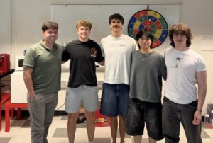 Jonathan Siegel (left), a CESSRST EPP Fellow, and his iCHARM computer coding team members: (L-R)Will Ruff, Elliot Gambale, William Phong, and Arthur Pasquinelli. Image credit: Christian Byars
